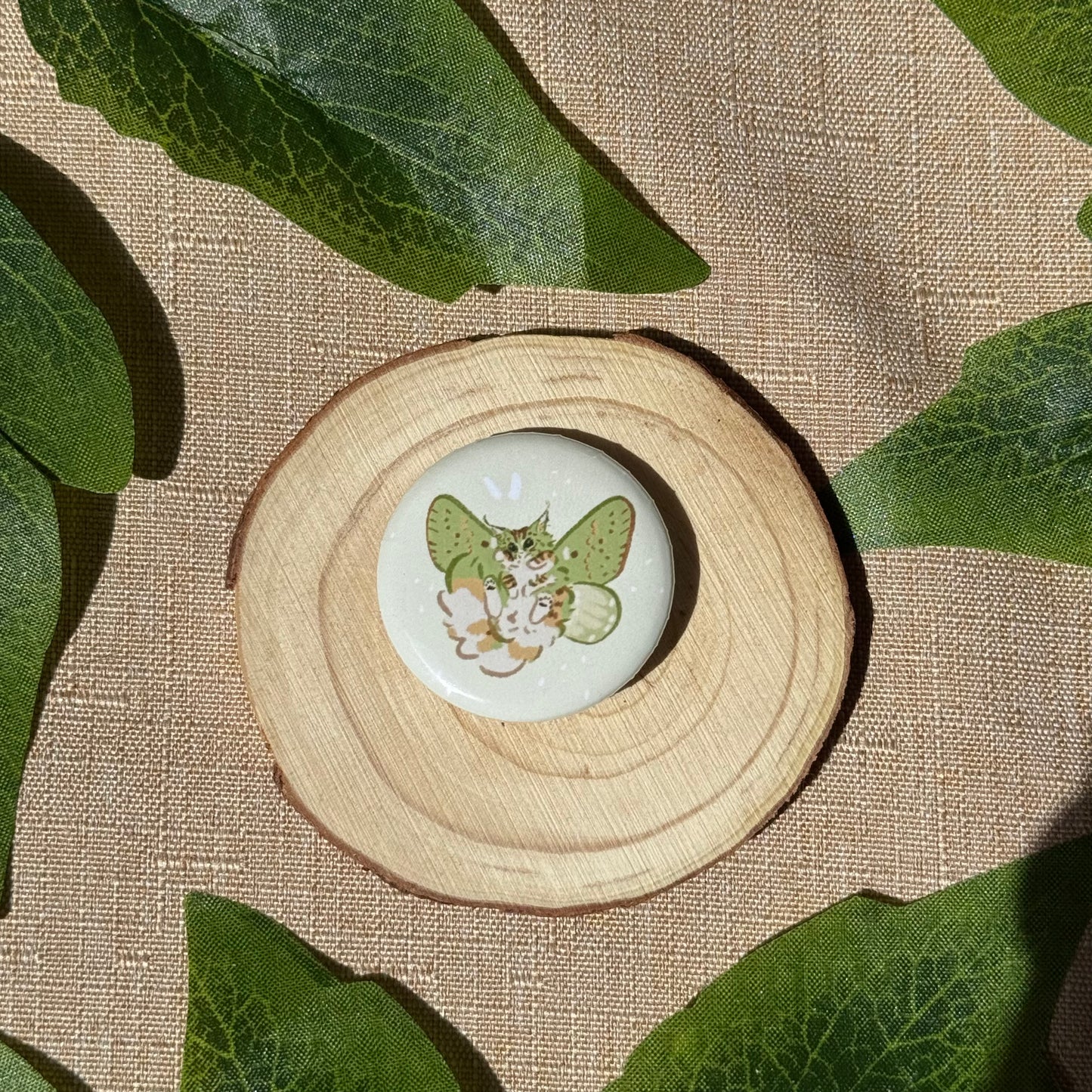 Liko Flying Button Badge